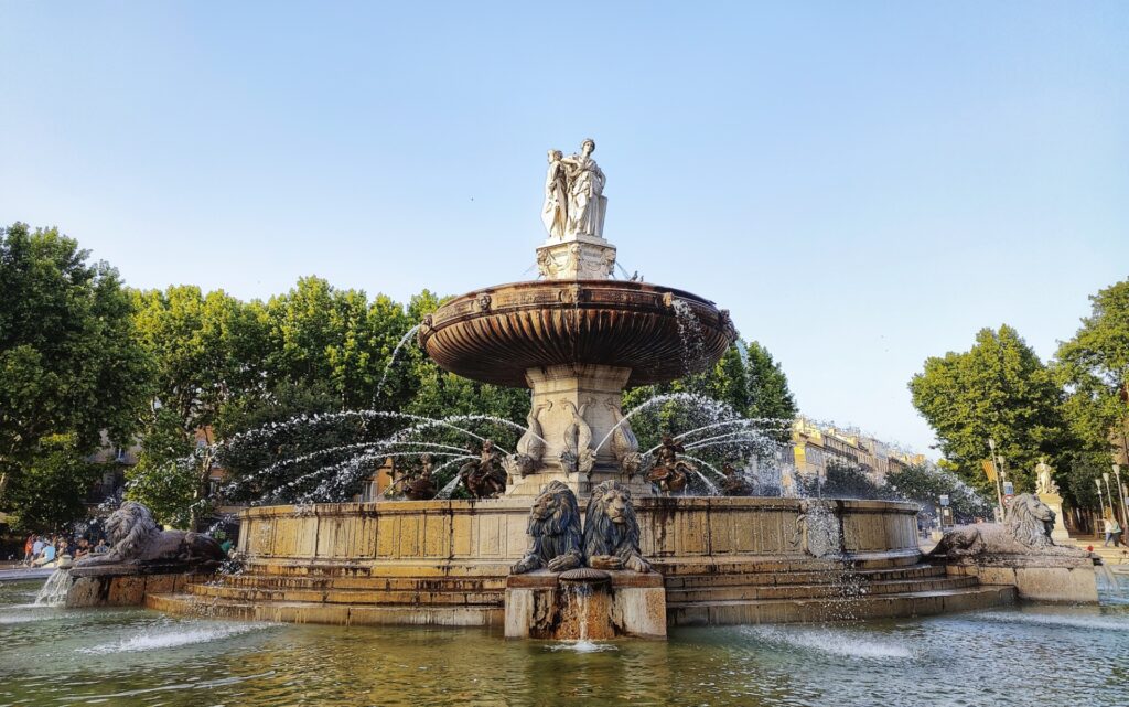 La Rotonde fountain in Aix-en-Provence with figures of women, dolphins and lions