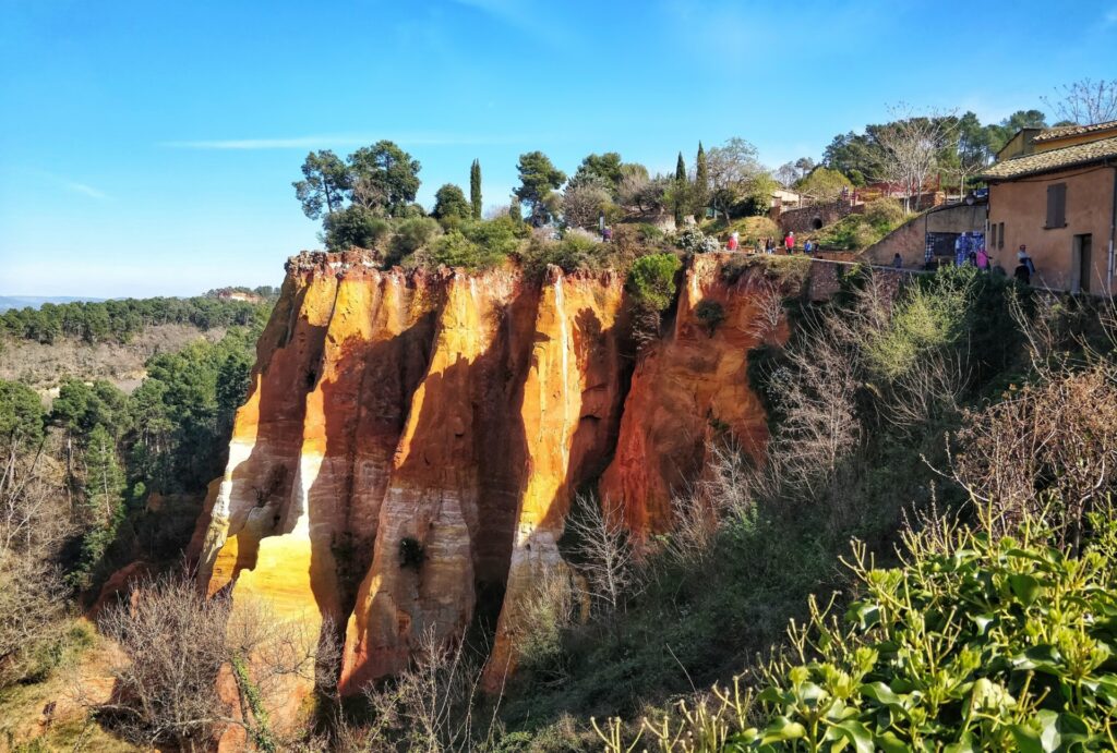 rugged ochre-colored cliffs of Roussillon Provence