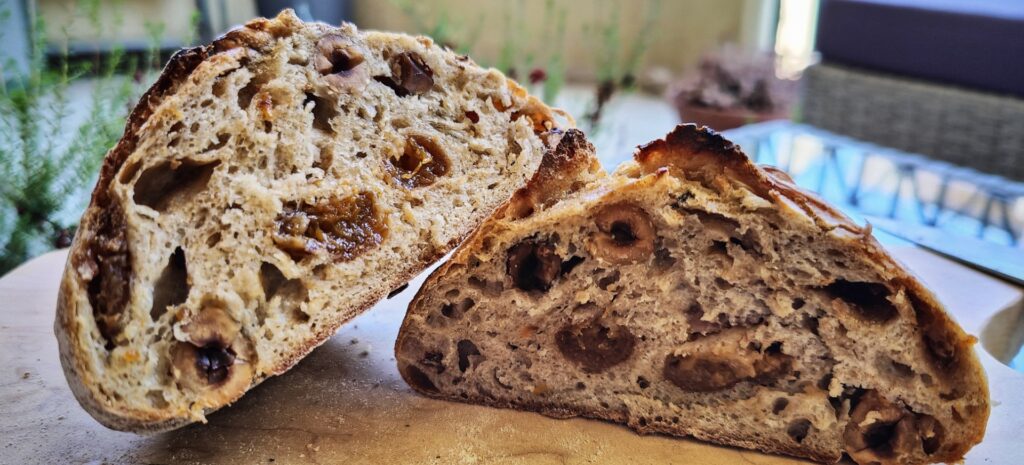 Loaf of fruit & nut bread cut in two